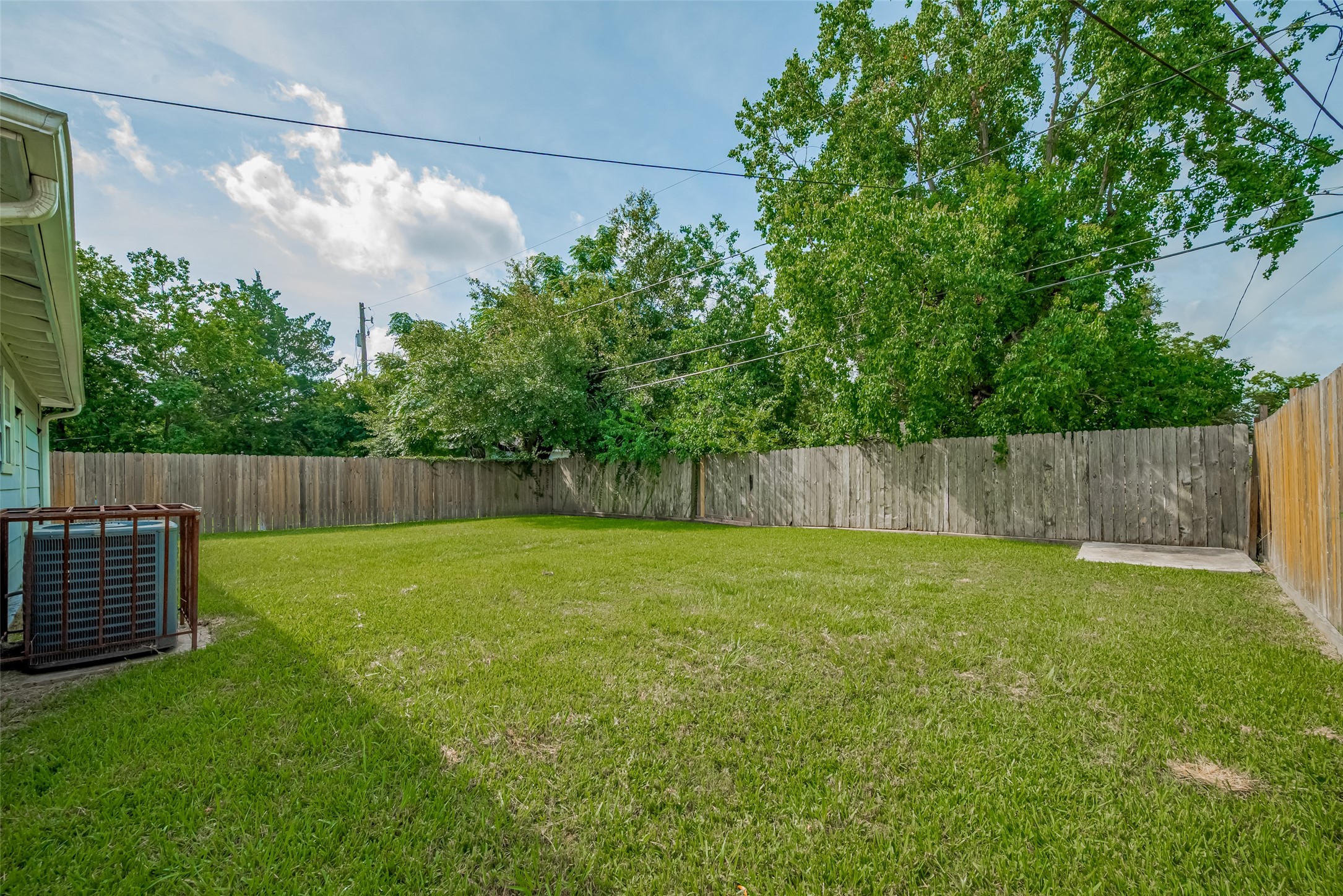 3930 Daphne Street Houston, TX 77021 - Photo 40 of 44 Enclosed and expansive, the backyard offers space to garden, gather, or simply enjoy the outdoors without leaving home.