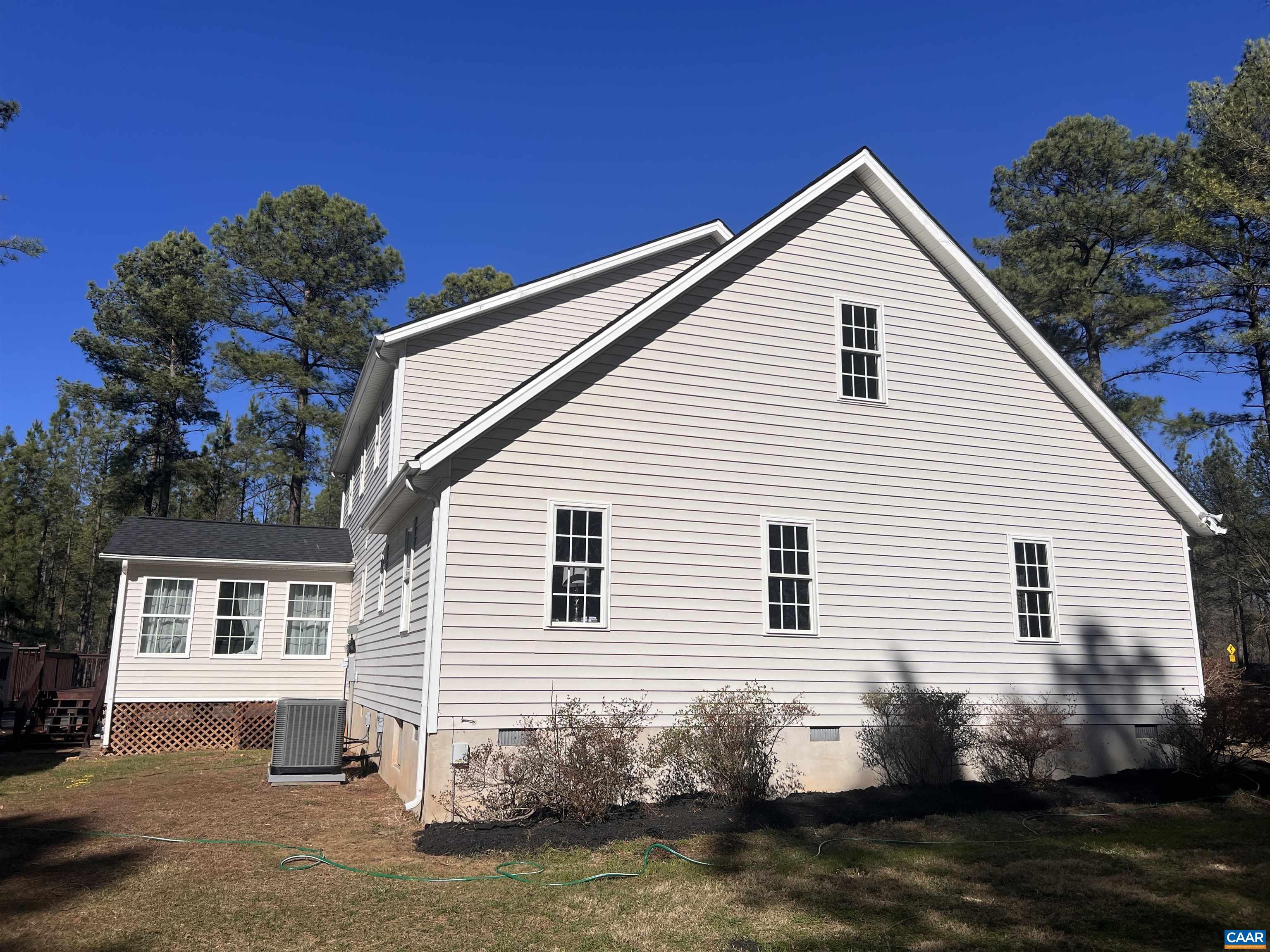 651 Kents Mill Road Louisa, VA 23093 - Photo 11 of 55 a view of a house with a yard
