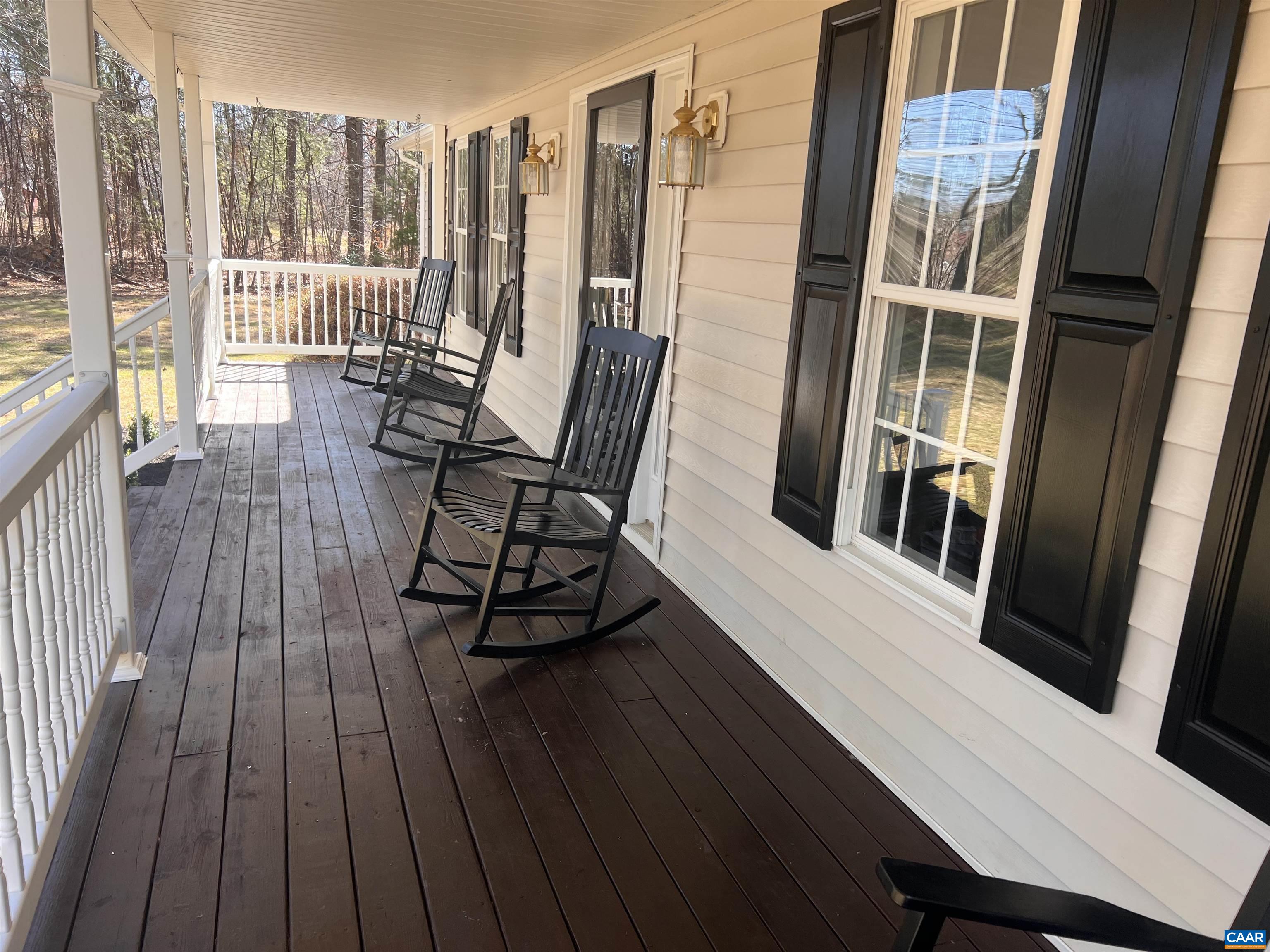651 Kents Mill Road Louisa, VA 23093 - Photo 12 of 55 a view of balcony with wooden floor and outdoor seating