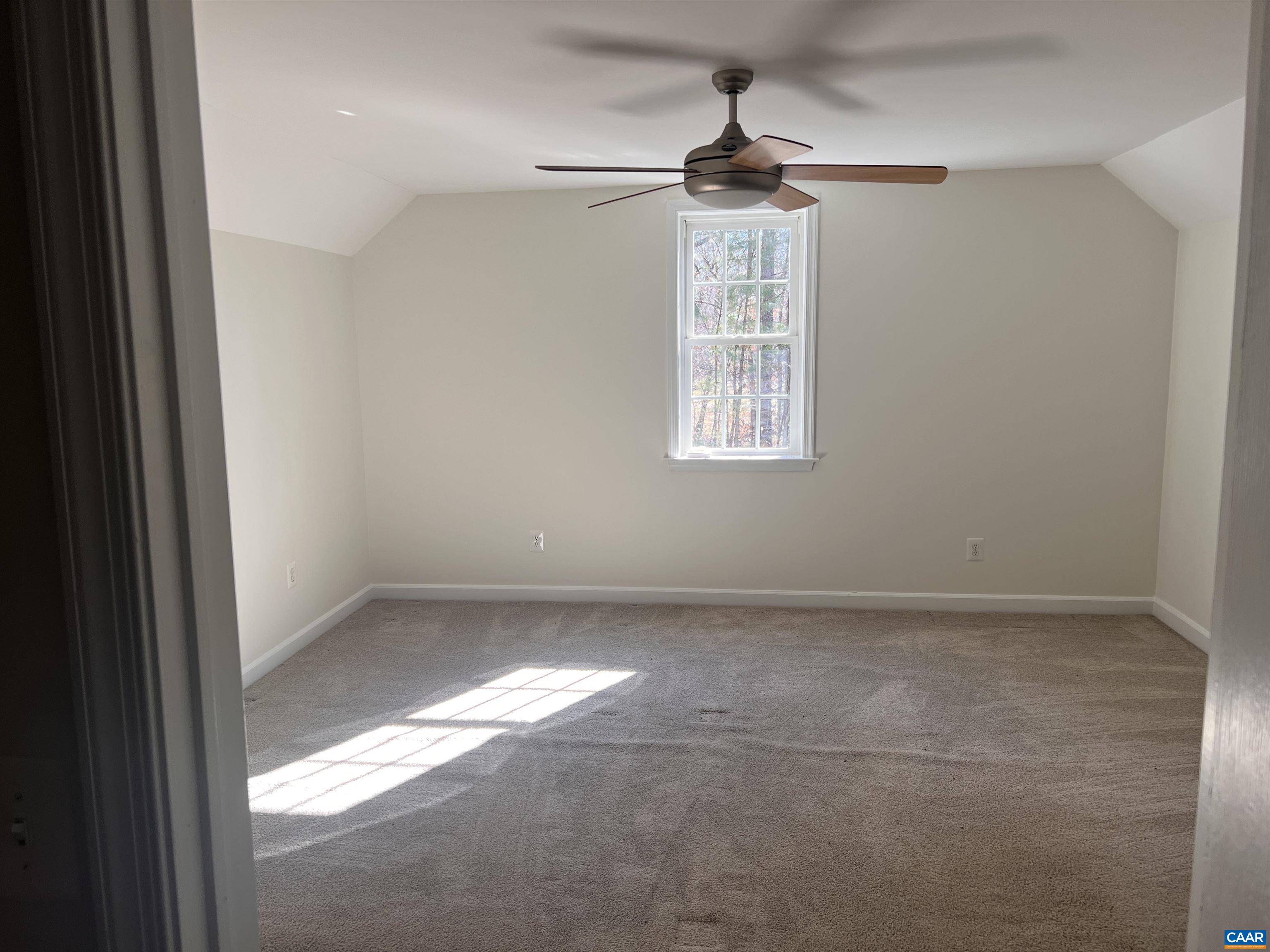 651 Kents Mill Road Louisa, VA 23093 - Photo 20 of 55 a view of an empty room with a window