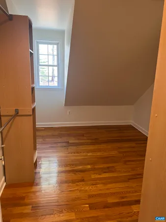 a bathroom with a double vanity sink toilet and shower
