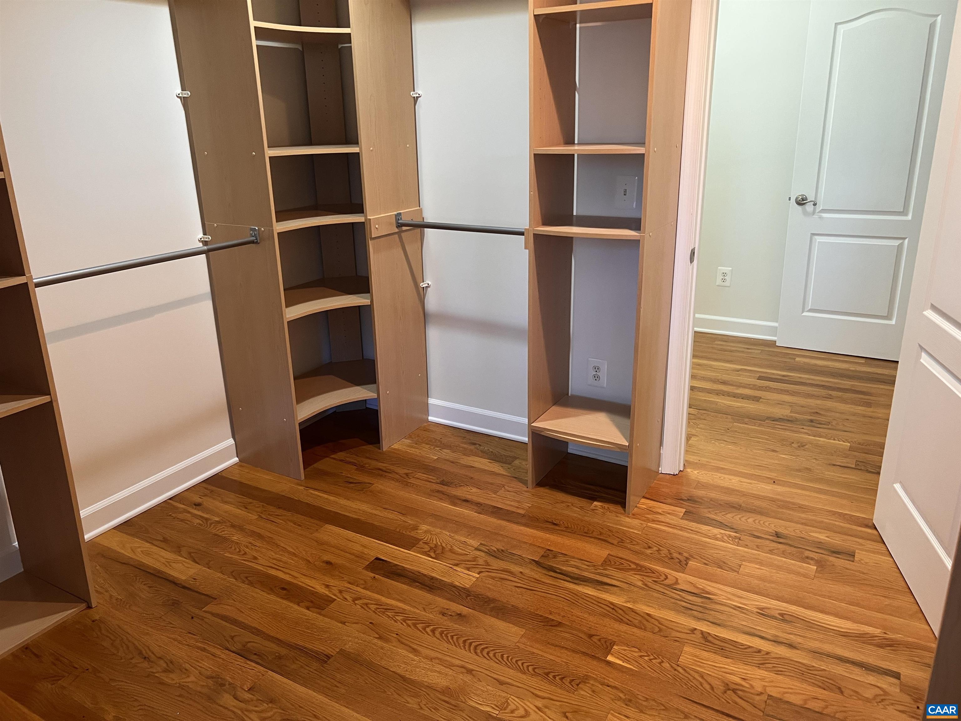 651 Kents Mill Road Louisa, VA 23093 - Photo 23 of 55 a view of an empty room with wooden floor and a window