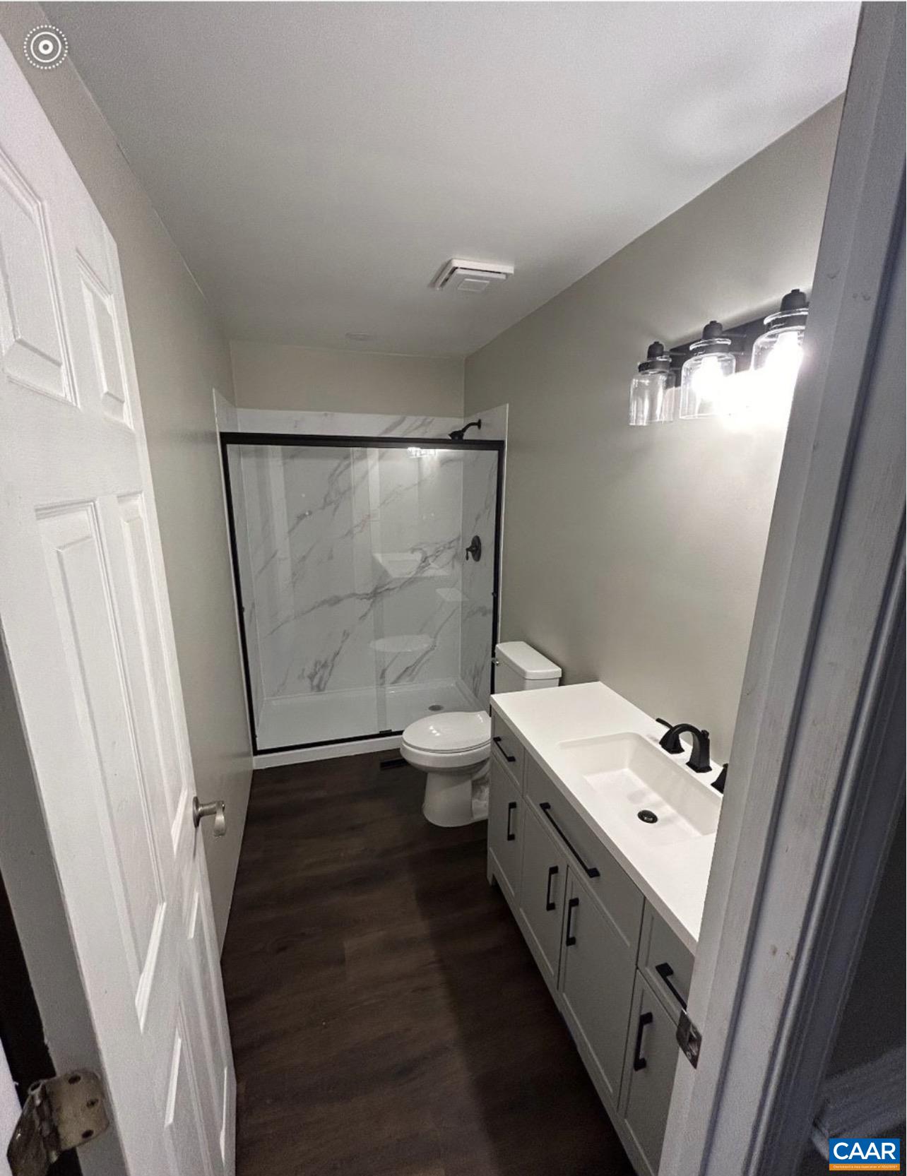 651 Kents Mill Road Louisa, VA 23093 - Photo 50 of 55 a bathroom with a double vanity sink toilet and shower