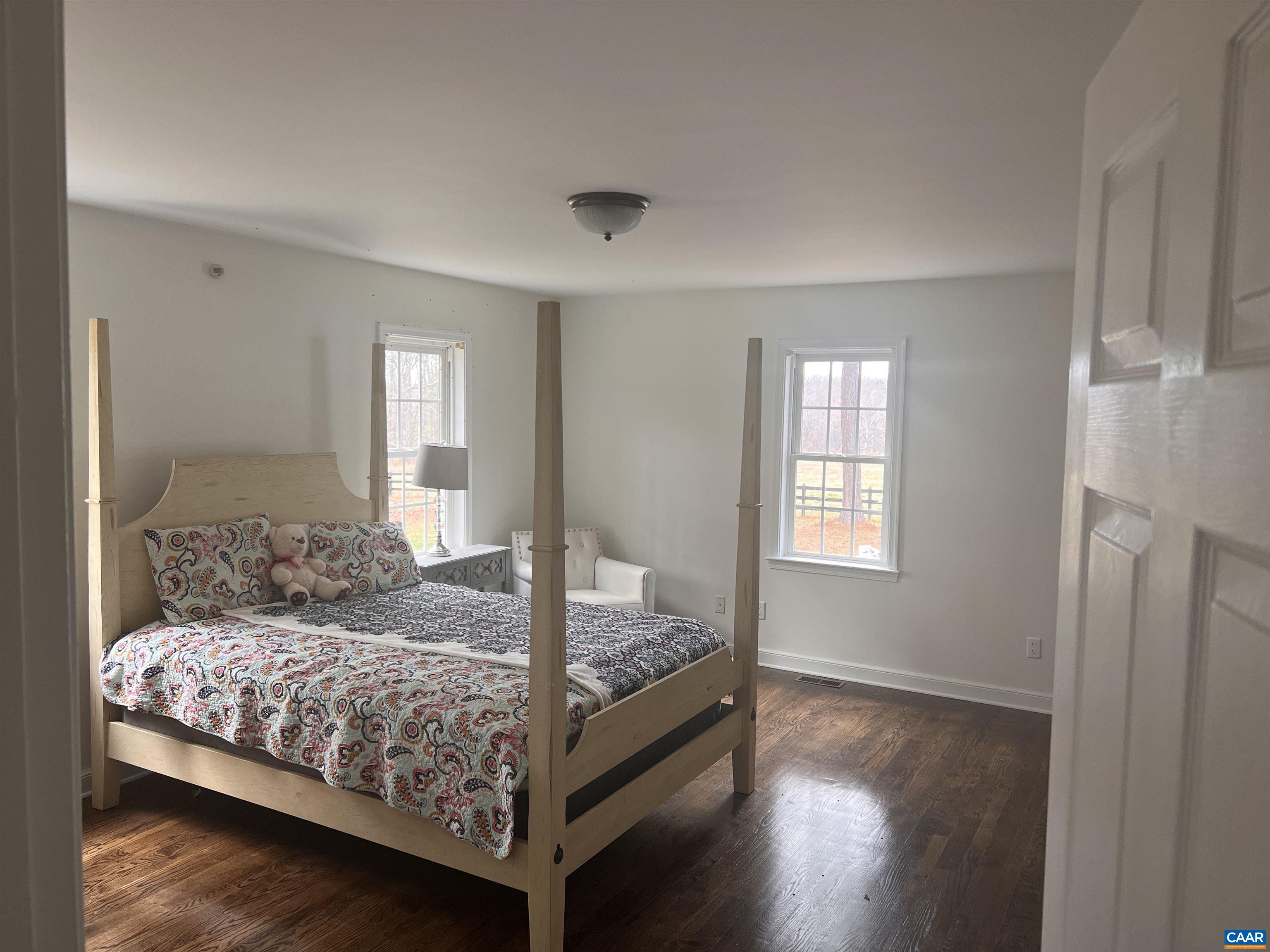 651 Kents Mill Road Louisa, VA 23093 - Photo 51 of 55 a bedroom with a bed and window