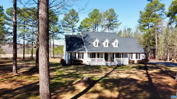 a front view of a house with a garage