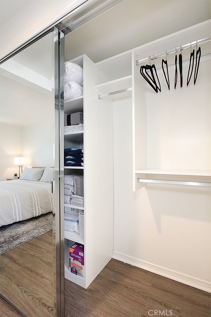 203 Cedar Street, Unit A & B Newport Beach, CA 92663 - Photo 11 of 32 a view of bedroom and bedroom with wooden floor