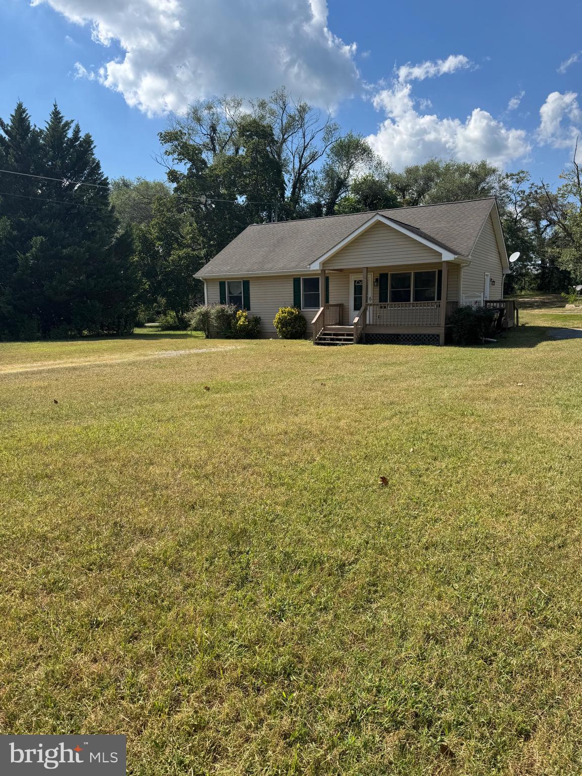 113 Boyce Mill Road Greensboro, MD 21639 - Photo 1 of 23 a front view of house with yard and green space