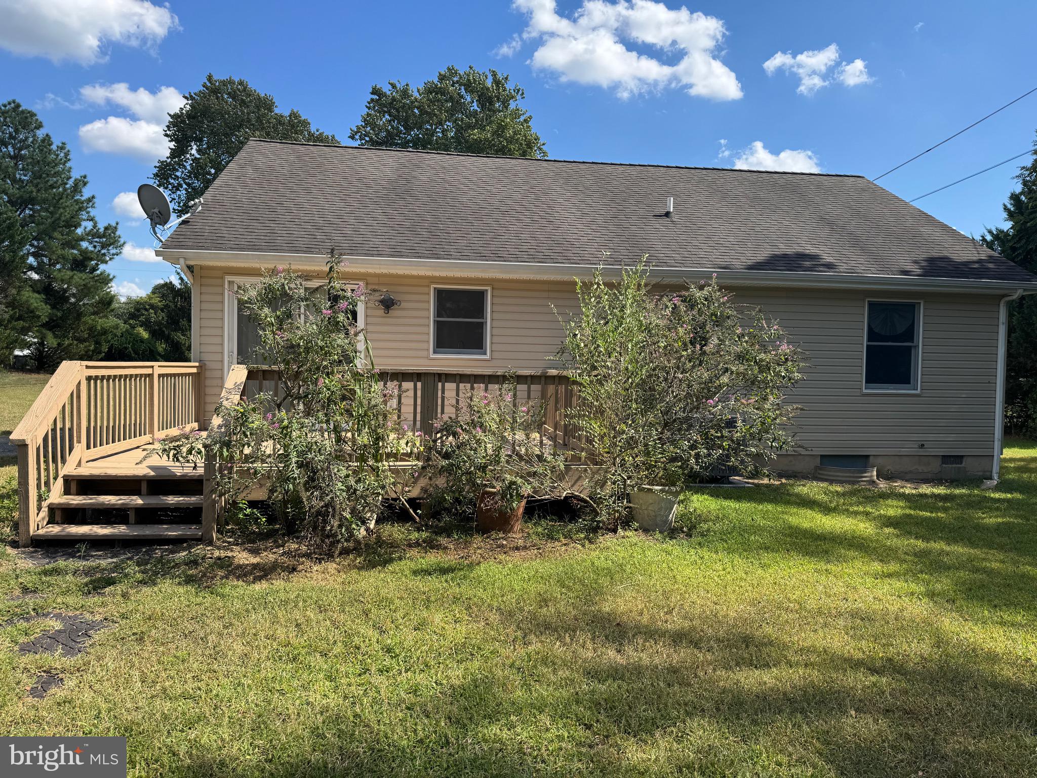 113 Boyce Mill Road Greensboro, MD 21639 - Photo 14 of 23 a aerial view of a house with a yard and a garage