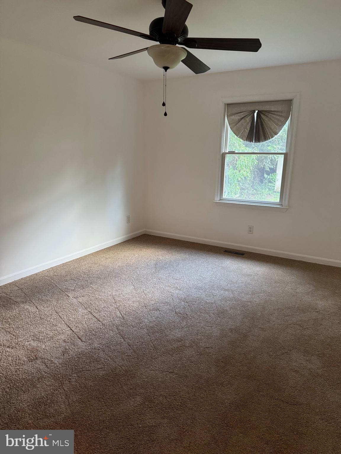 113 Boyce Mill Road Greensboro, MD 21639 - Photo 7 of 23 a view of an empty room with a window