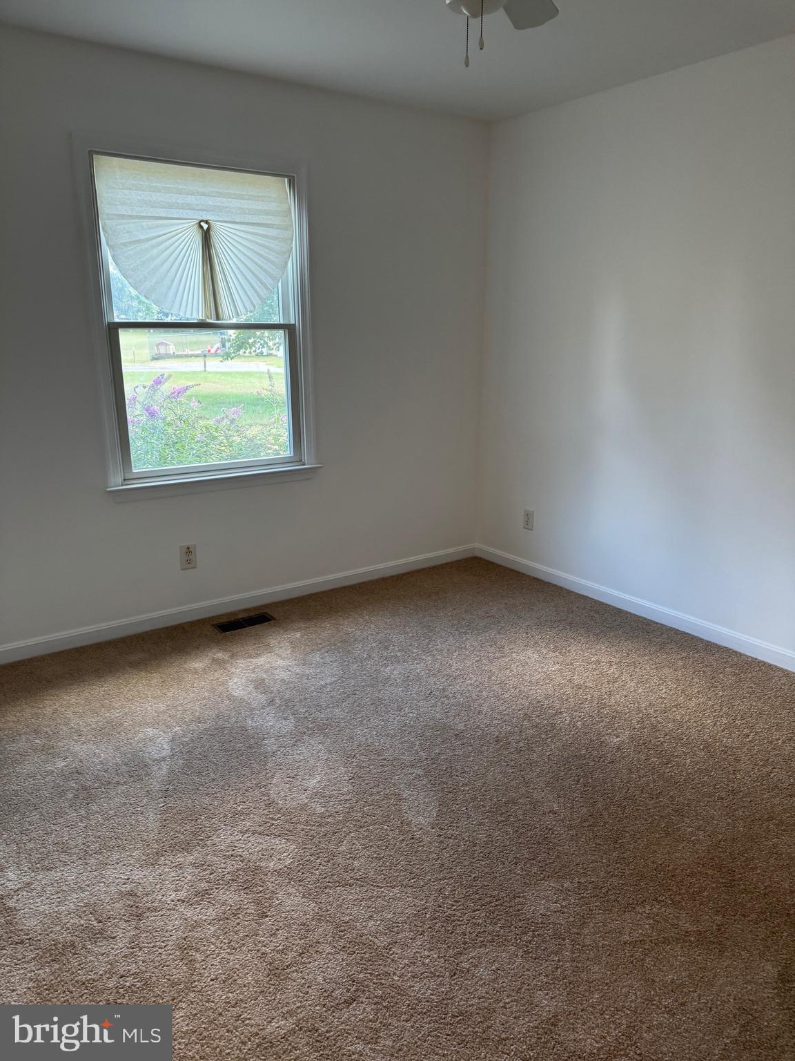 113 Boyce Mill Road Greensboro, MD 21639 - Photo 8 of 23 an empty room with a window