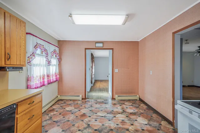 a view of an empty room and window