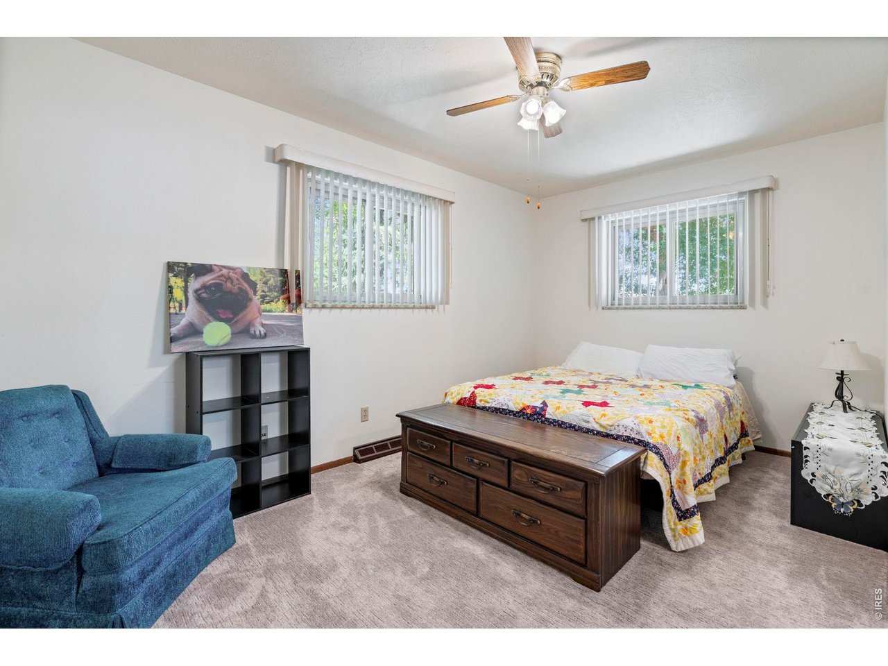 300 Ranch Acres Drive Loveland, CO 80538 - Photo 22 of 38 a bedroom with bed and window