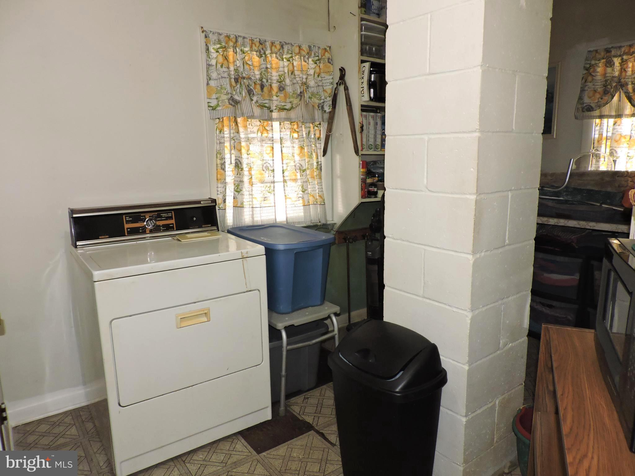 8470 Bussenius Road Pasadena, MD 21122 - Photo 16 of 29 Upper level laundry room