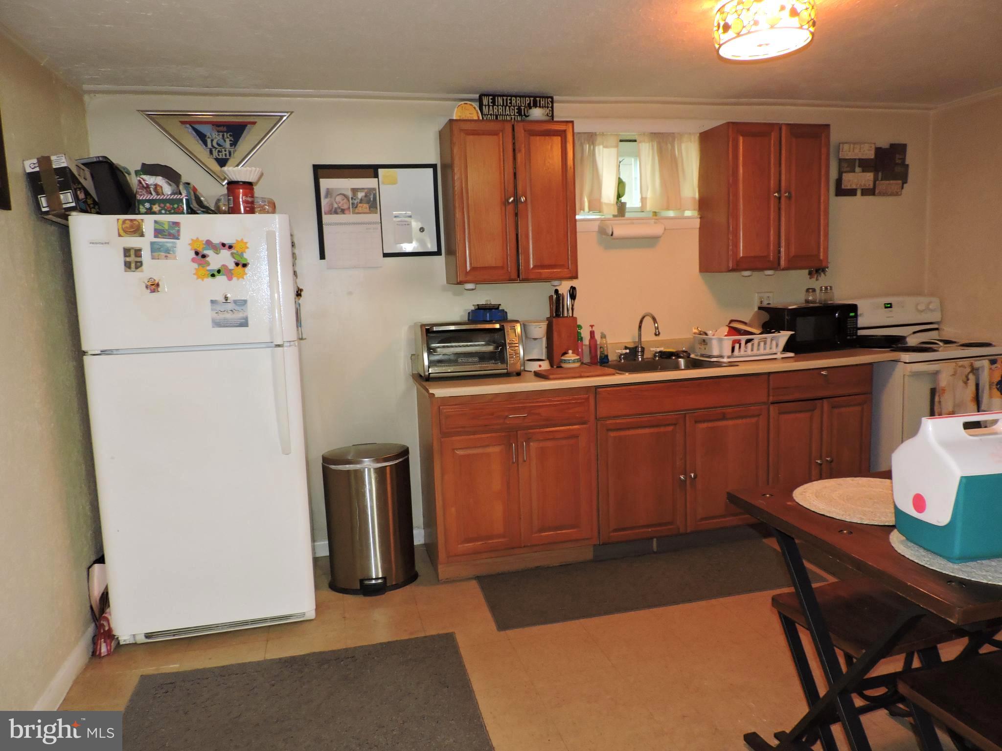 8470 Bussenius Road Pasadena, MD 21122 - Photo 23 of 29 Lower kitchen