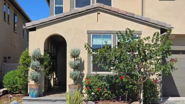 a view of a house with sitting area