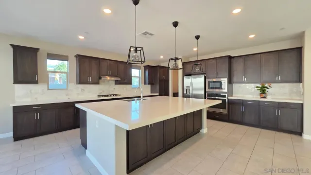 a aerial view of a house with a yard