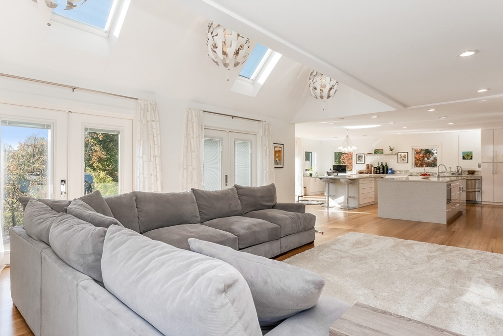 2-4 Evergreen Avenue Newton, MA 02466 - Photo 13 of 41 a living room with furniture and view of kitchen