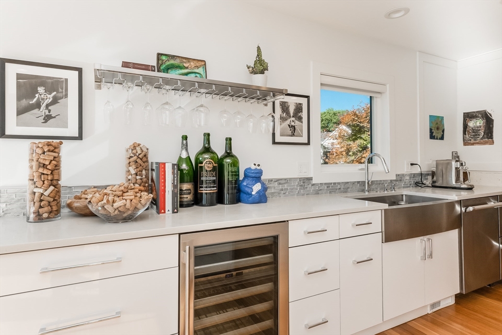 2-4 Evergreen Avenue Newton, MA 02466 - Photo 20 of 41 a kitchen with white cabinets and sink
