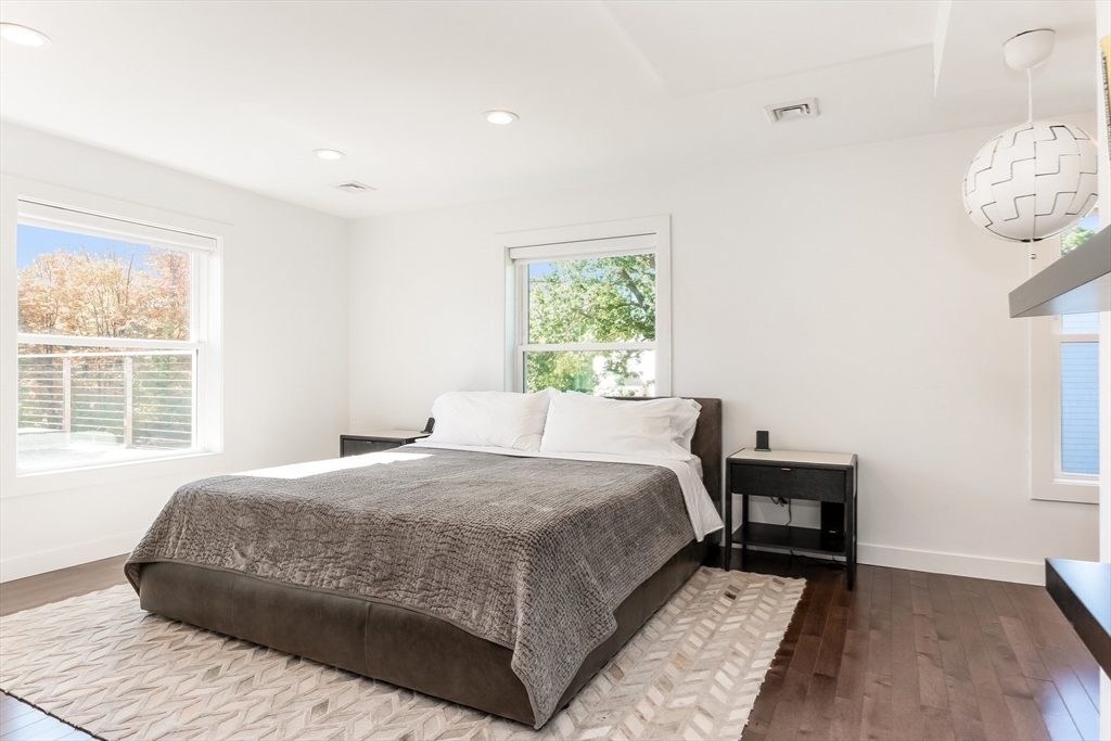 2-4 Evergreen Avenue Newton, MA 02466 - Photo 22 of 41 a bedroom with a bed and window