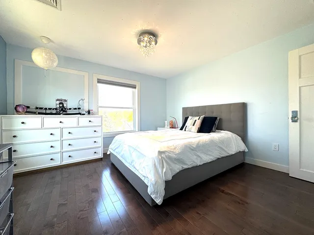 a picture of a wall with a white building