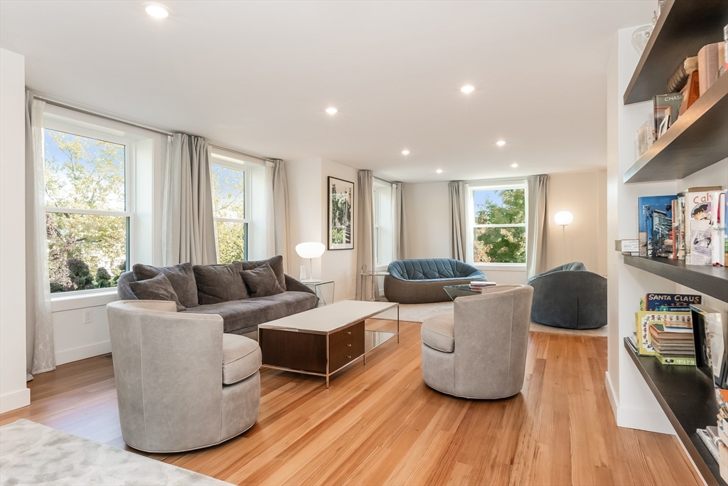 2-4 Evergreen Avenue Newton, MA 02466 - Photo 8 of 41 a living room with furniture and a wooden floor
