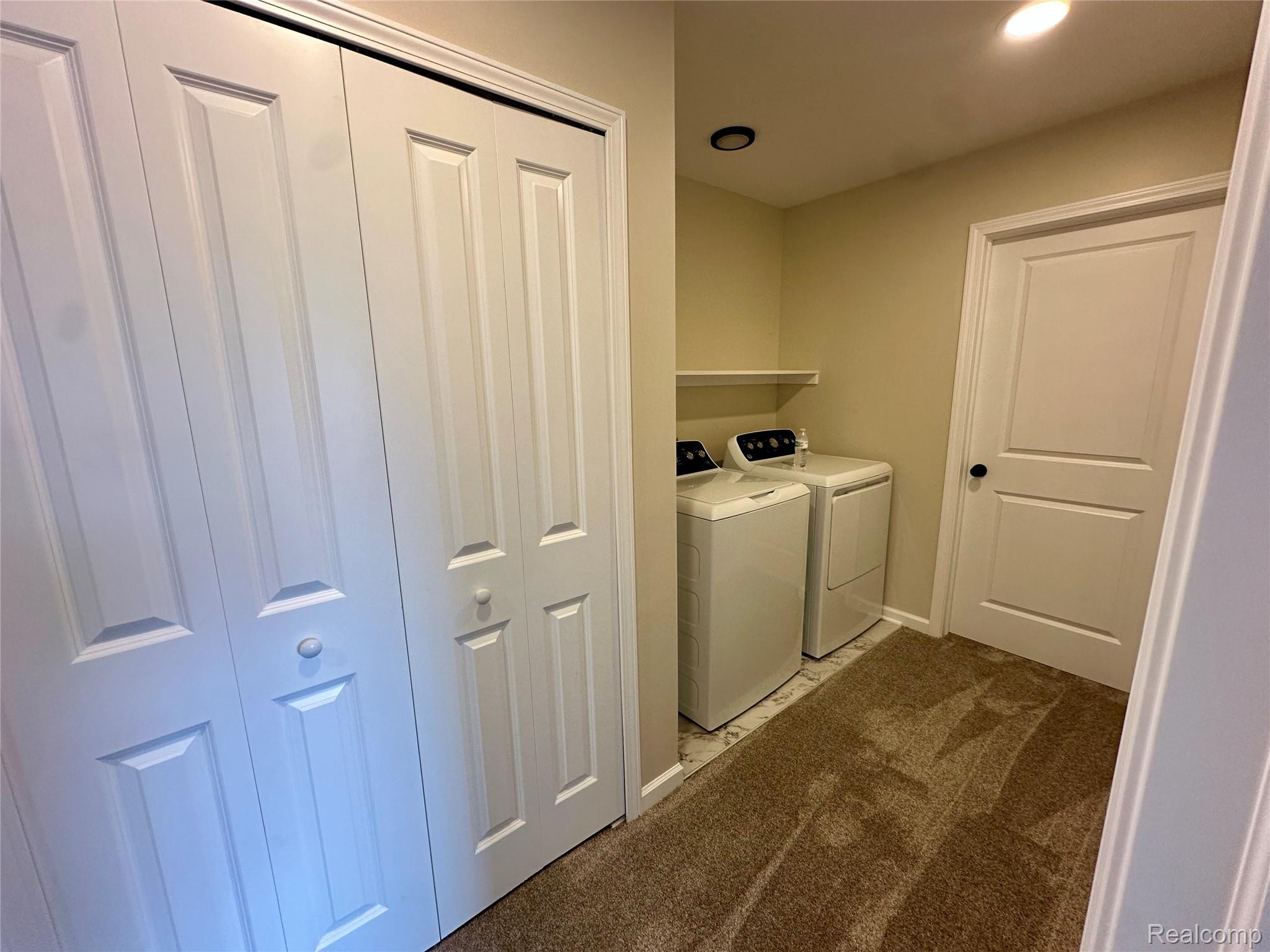 2670 Riley Center Road Memphis, MI 48041 - Photo 35 of 39 Laundry area with separate washer and dryer, light carpet, and recessed lighting