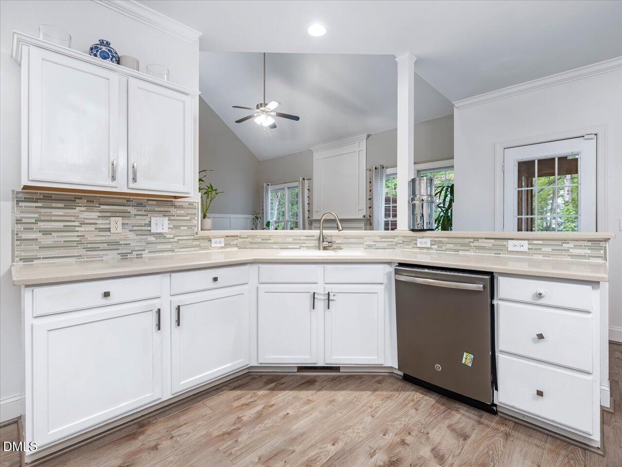 1311 Pendula Path Apex, NC 27502 - Photo 12 of 30 a spacious bathroom with a granite countertop double sink and a mirror