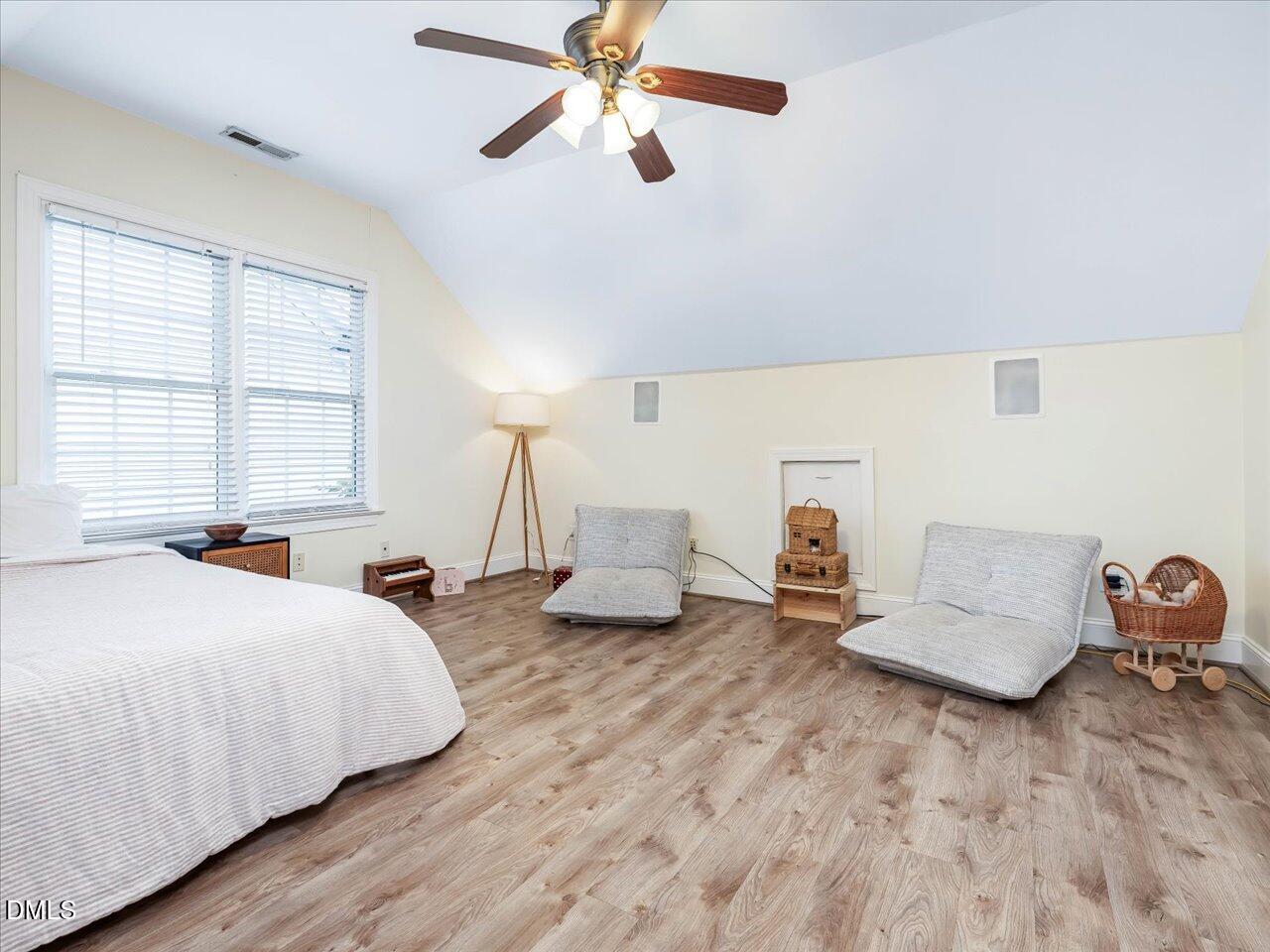 1311 Pendula Path Apex, NC 27502 - Photo 18 of 30 a bedroom with two beds and a couch