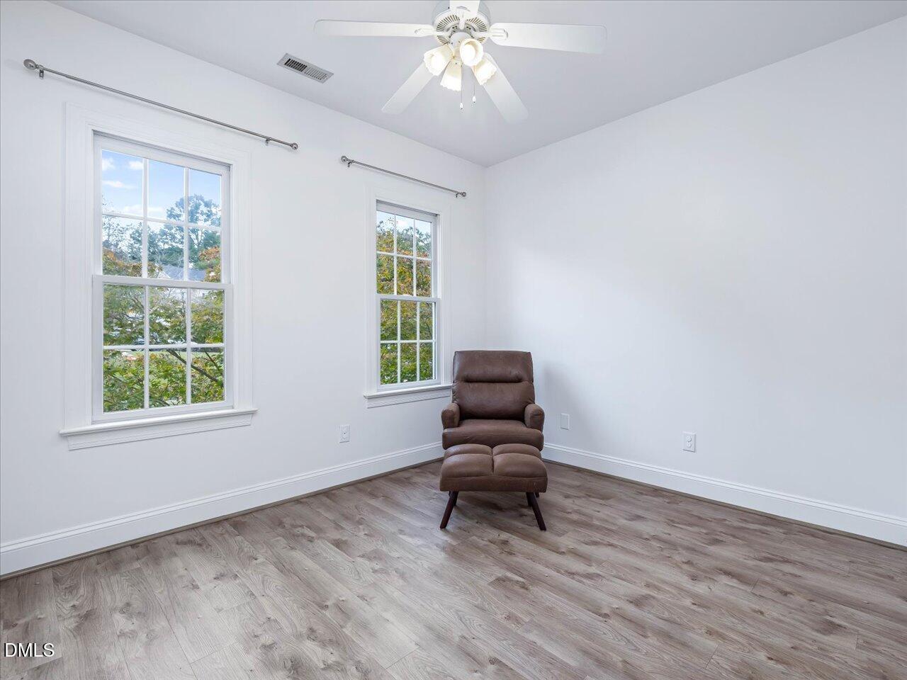 1311 Pendula Path Apex, NC 27502 - Photo 21 of 30 a living room with furniture and a window