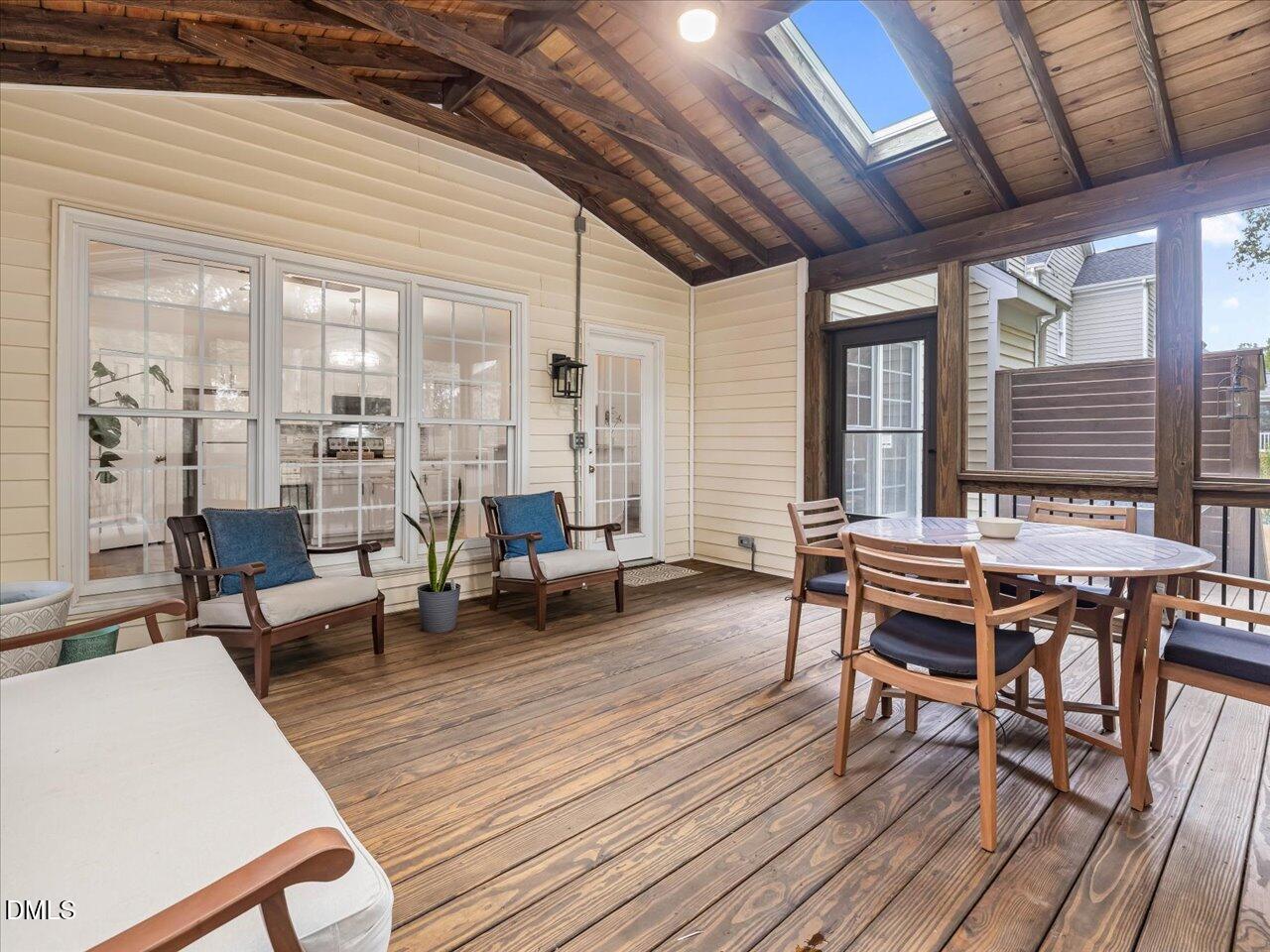 1311 Pendula Path Apex, NC 27502 - Photo 3 of 30 a living room with furniture a wooden floor and next to a window