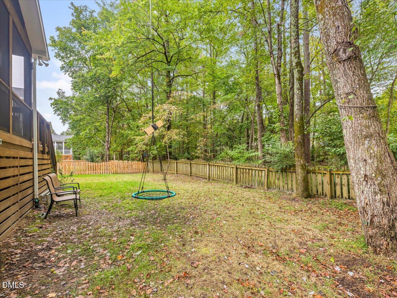 1311 Pendula Path Apex, NC 27502 - Photo 5 of 30 a backyard of a house with lots of green space