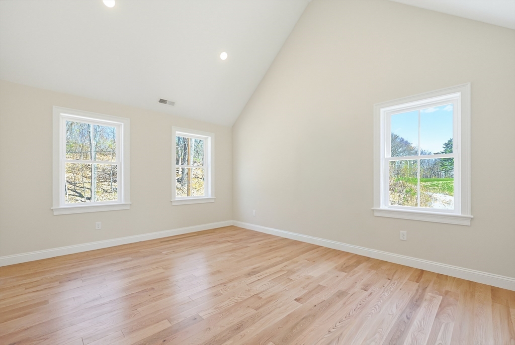 112 West Meadow Road Townsend, MA 01474 - Photo 22 of 38 a view of an empty room with wooden floor and a window
