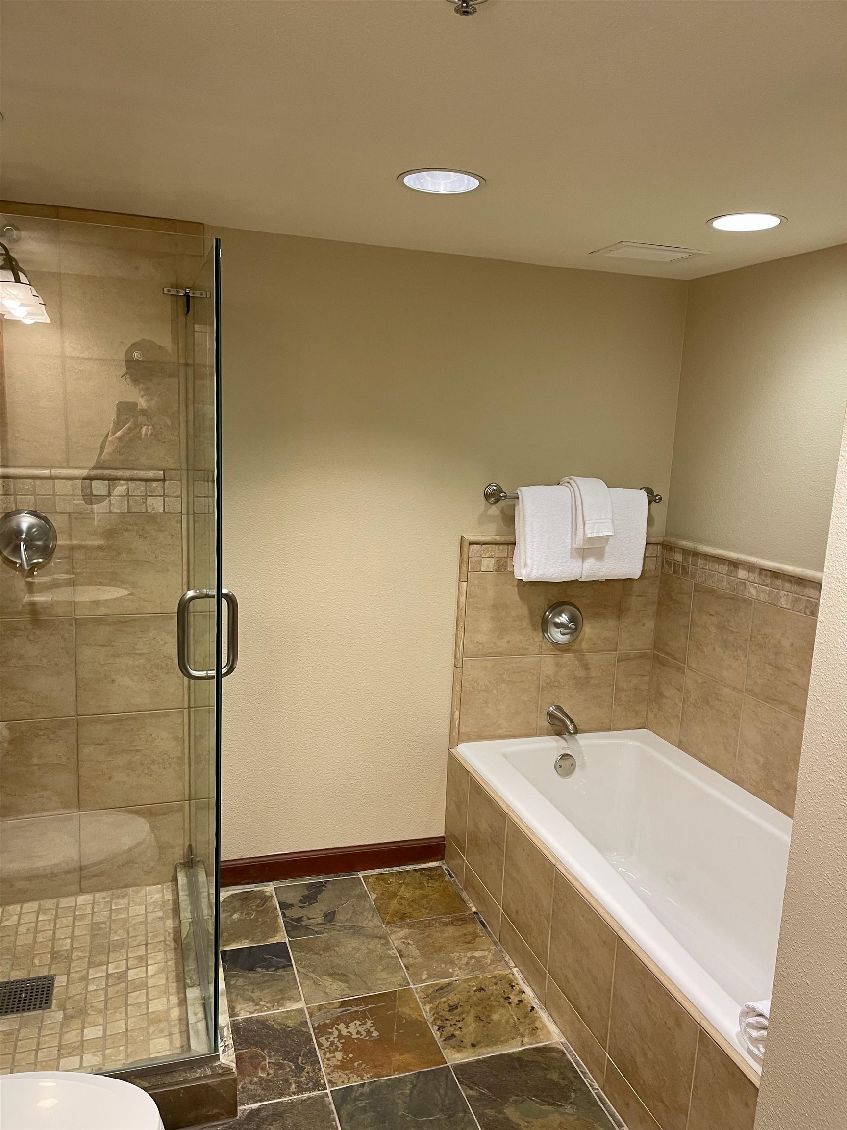 400 Resort Road, Unit 242 244 Olympic Valley, CA 96146 - Photo 13 of 28 a bathroom with a bathtub and a shower