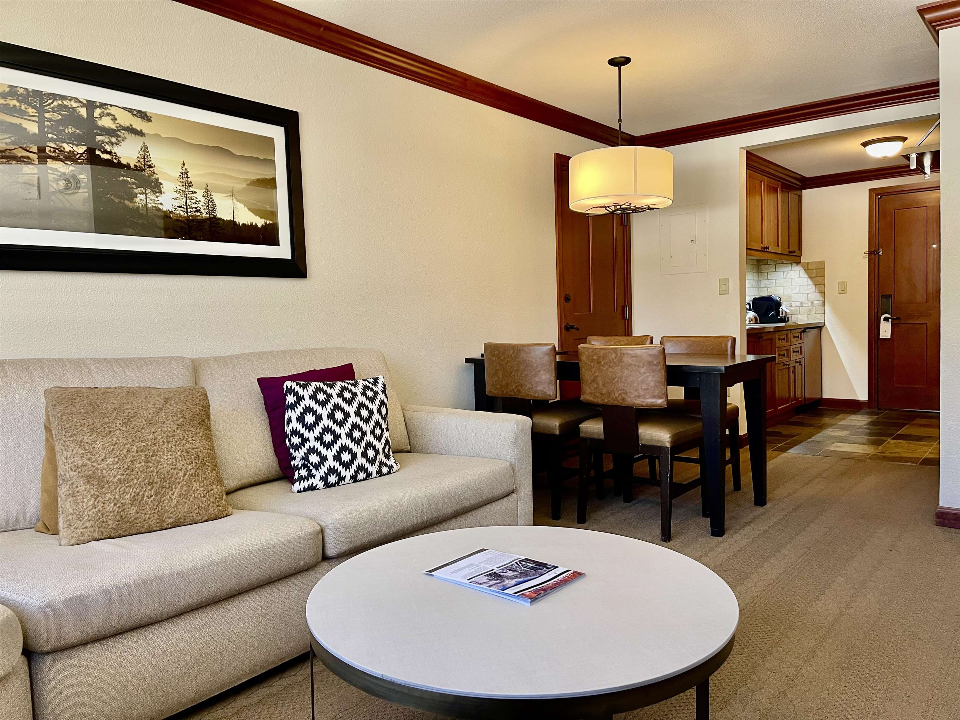 400 Resort Road, Unit 242 244 Olympic Valley, CA 96146 - Photo 4 of 28 a living room with furniture and wooden floor