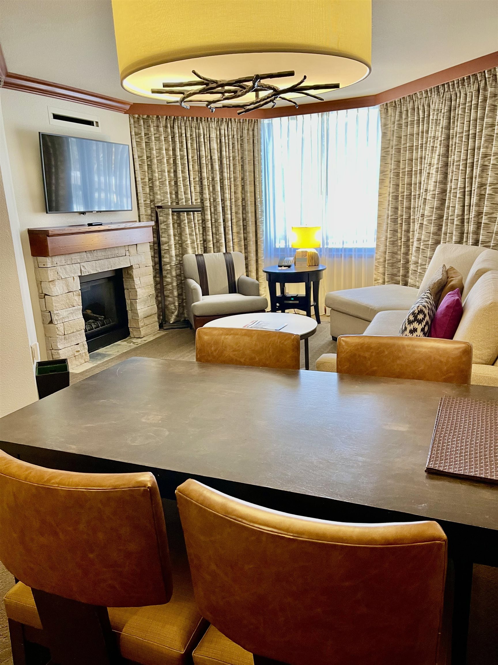 400 Resort Road, Unit 242 244 Olympic Valley, CA 96146 - Photo 5 of 28 a living room with furniture and a fireplace