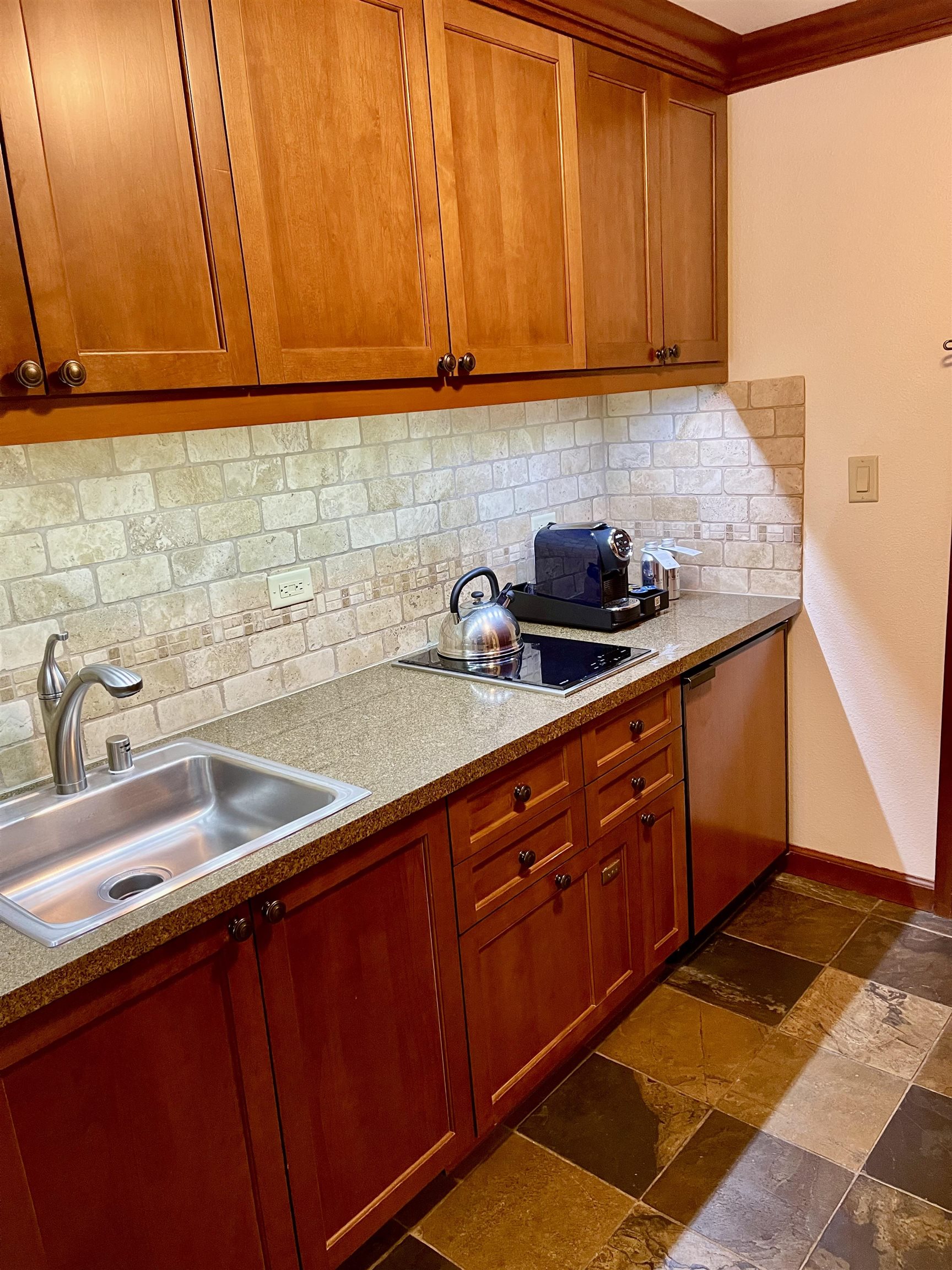 400 Resort Road, Unit 242 244 Olympic Valley, CA 96146 - Photo 8 of 28 a kitchen with a sink and cabinets