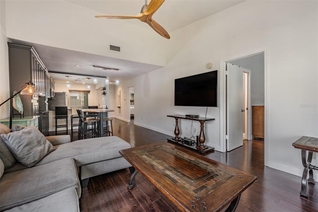 637 Drake Lane North Dunedin, FL 34698 - Photo 14 of 43 a living room with furniture and a flat screen tv