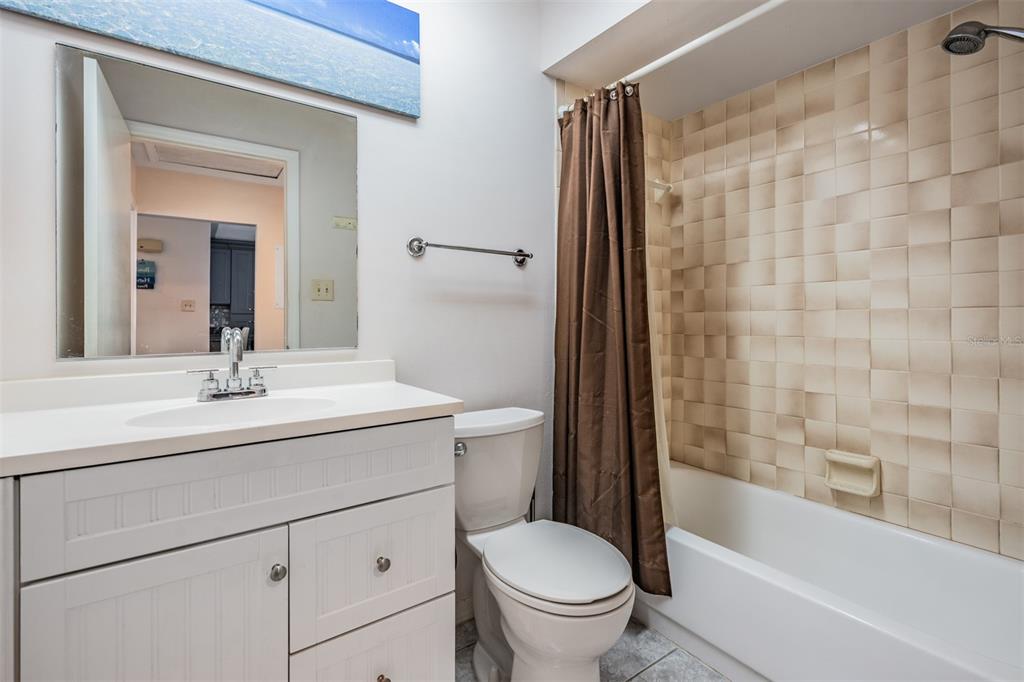 637 Drake Lane North Dunedin, FL 34698 - Photo 22 of 43 a bathroom with a sink toilet and shower