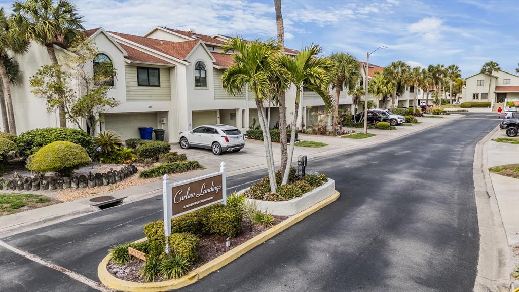 637 Drake Lane North Dunedin, FL 34698 - Photo 38 of 43 a view of a street with cars
