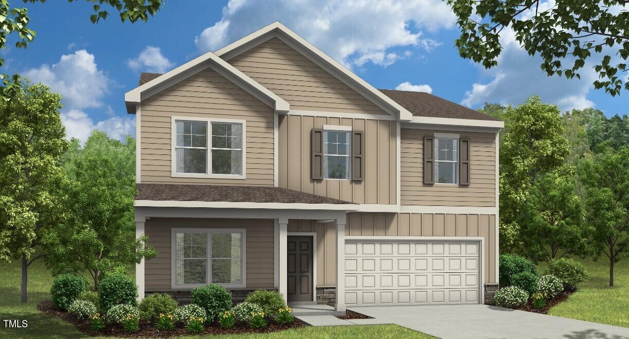 6424 Winter Spring Drive Wake Forest, NC 27587 - Photo 1 of 3 a front view of a house with a garage