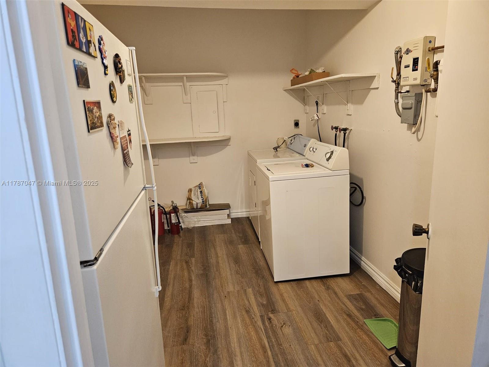 13745 Southwest 84th Street, Unit A Miami, FL 33143 - Photo 13 of 16 a utility room with dryer and washer