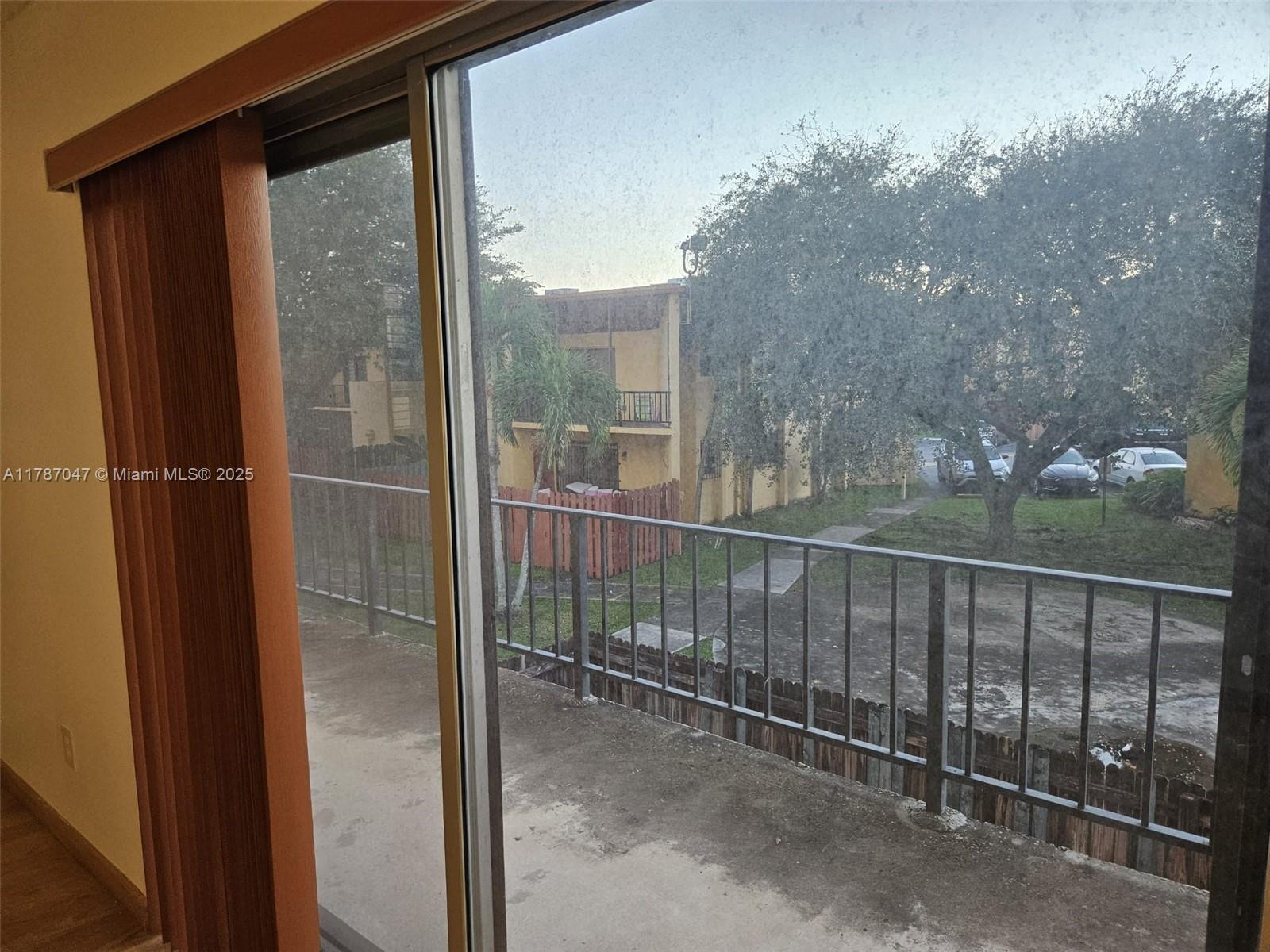 13745 Southwest 84th Street, Unit A Miami, FL 33143 - Photo 15 of 16 a view of a balcony