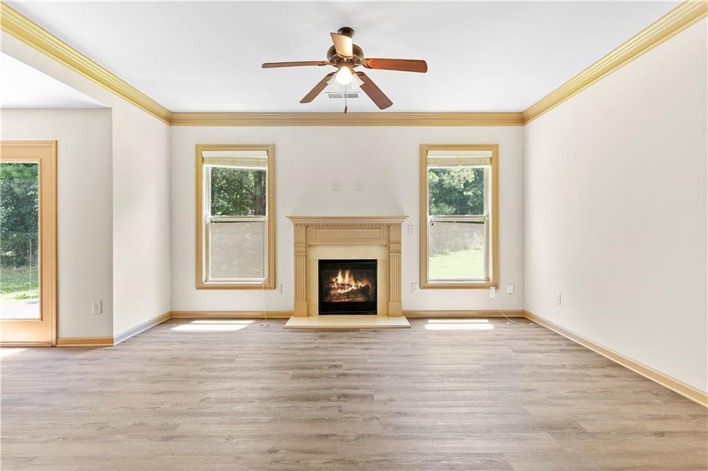 1492 Station Ridge Court Southeast Lawrenceville, GA 30045 - Photo 17 of 50 a view of a livingroom with a fireplace and window