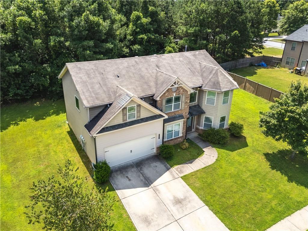 1492 Station Ridge Court Southeast Lawrenceville, GA 30045 - Photo 2 of 50 a view of a house with pool