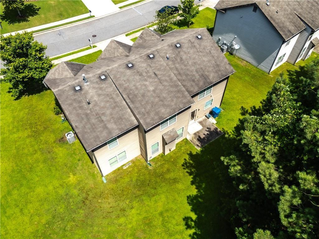 1492 Station Ridge Court Southeast Lawrenceville, GA 30045 - Photo 3 of 50 an aerial view of a house with a swimming pool