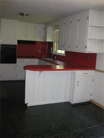143 East Allen Ridge Road Springfield, MA 01118 - Photo 4 of 18 a kitchen with a sink and cabinets