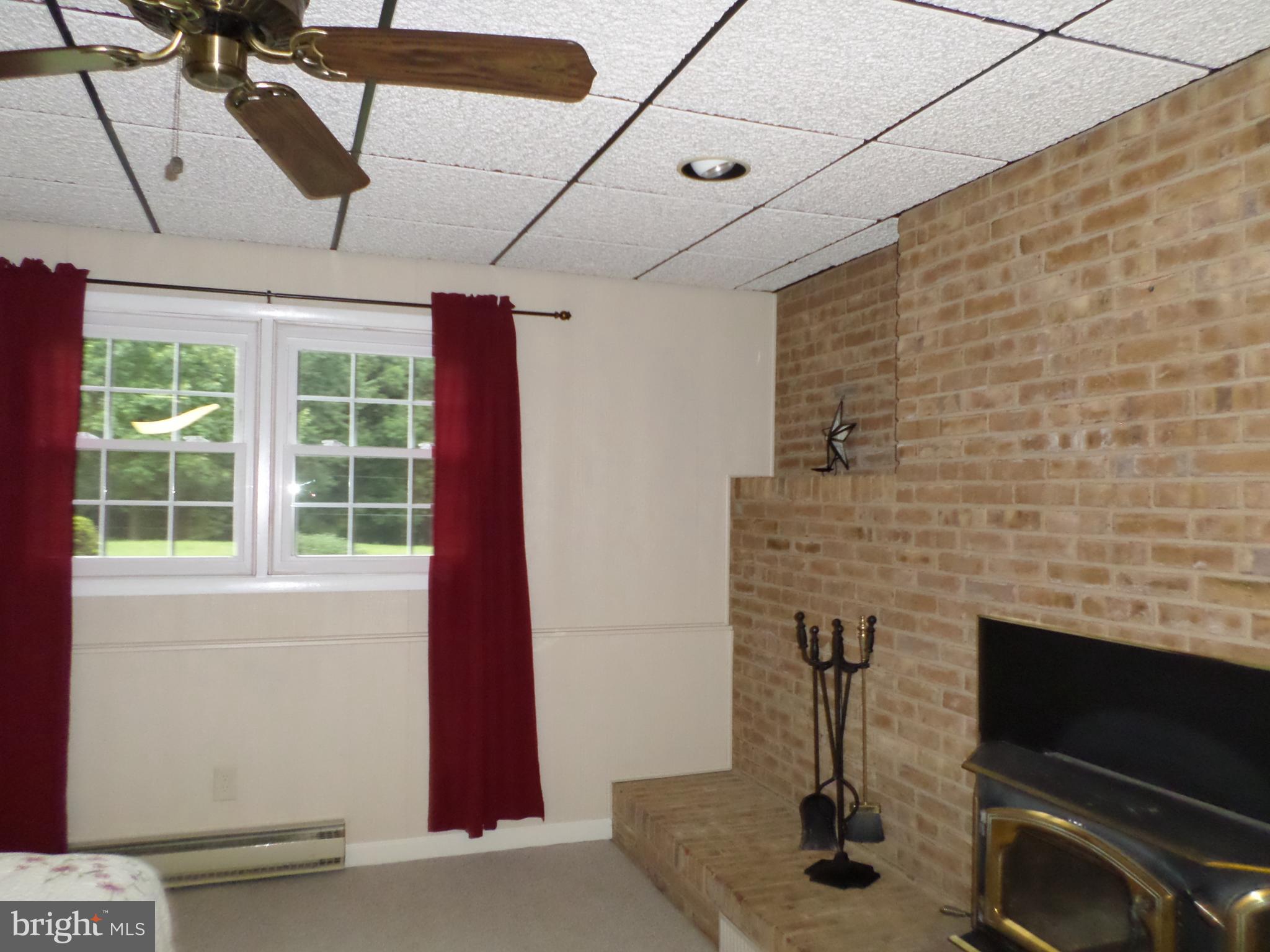18337 Manor Church Road Boonsboro, MD 21713 - Photo 20 of 30 Another brick FP with woodstove insert