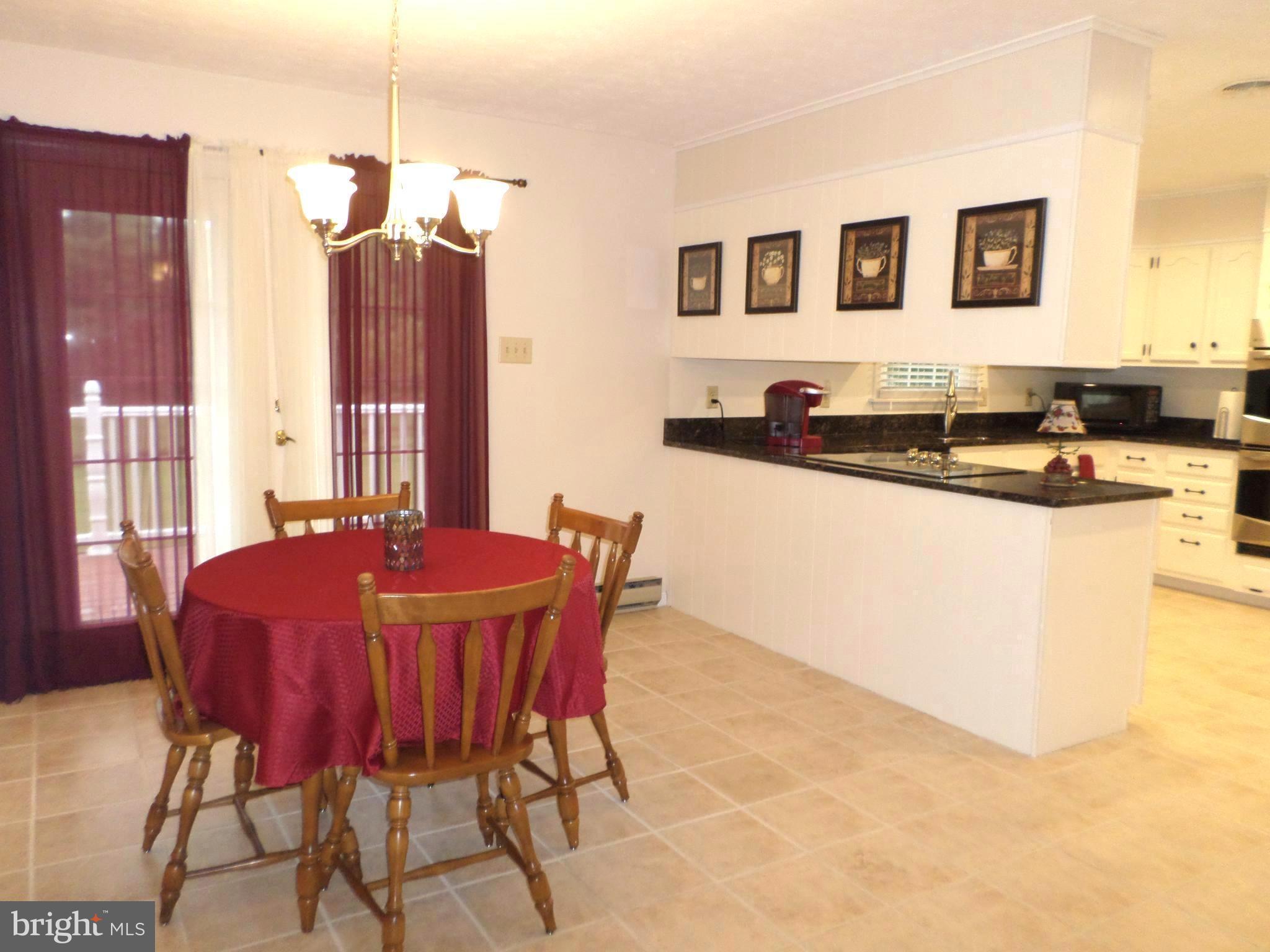 18337 Manor Church Road Boonsboro, MD 21713 - Photo 7 of 30 Kitchen eating area and doors to deck