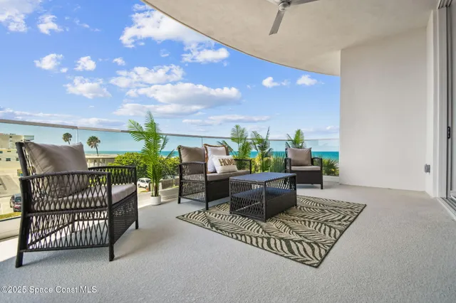 a bathroom with a double vanity sink a mirror and a bathtub