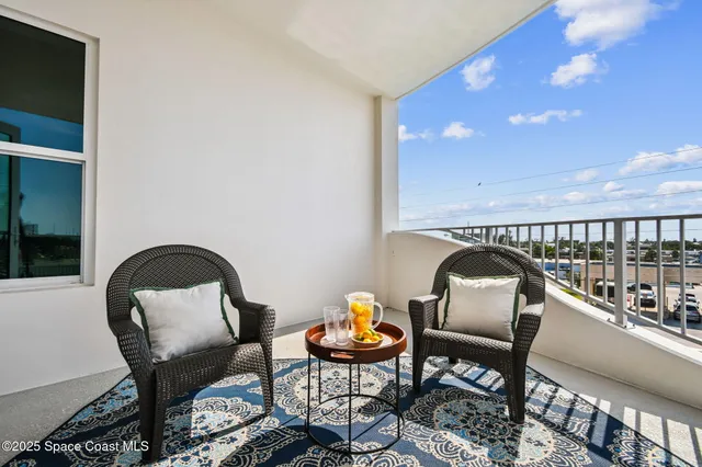 an empty room with a ceiling fan and a window